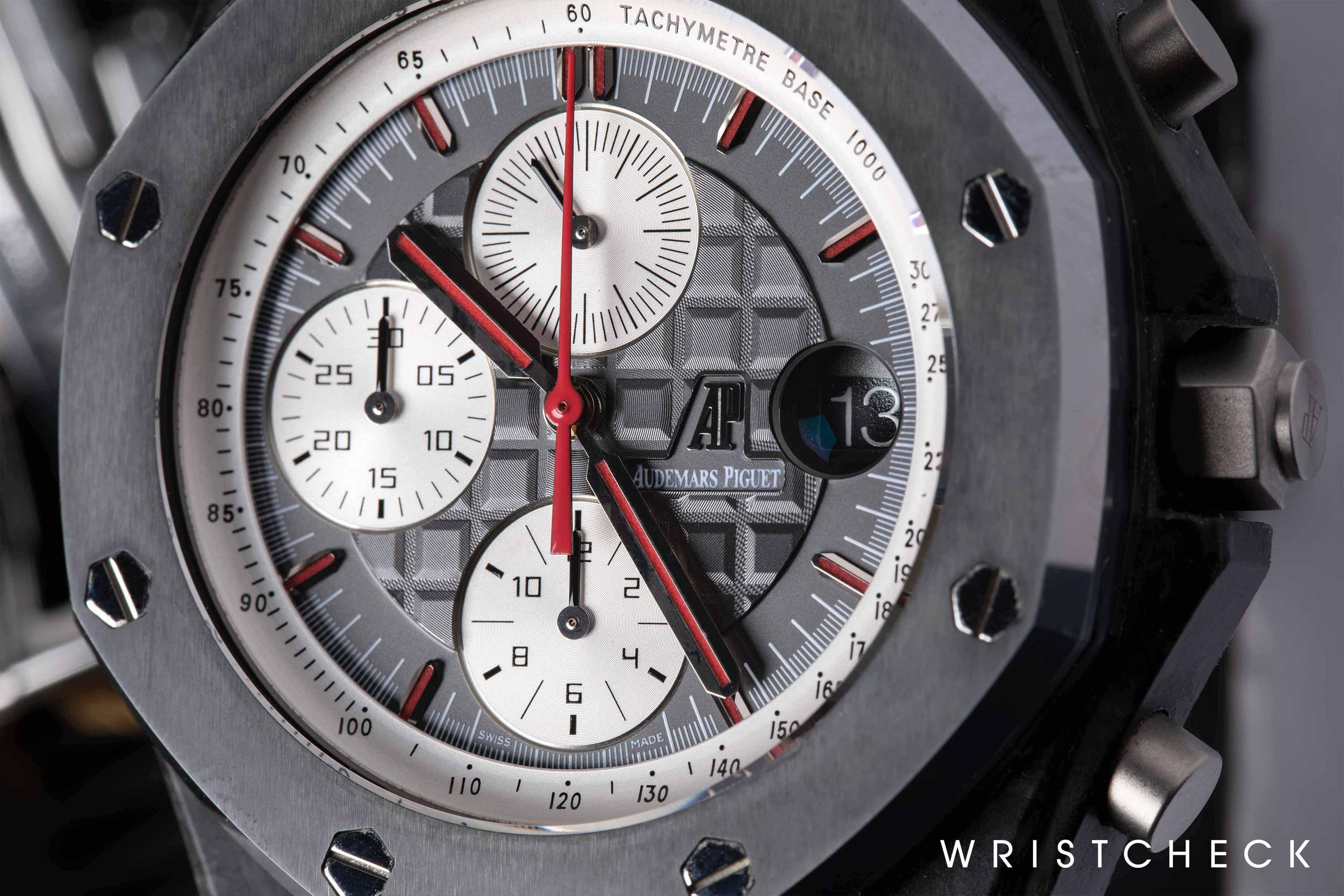 Forged carbon case, cermet bezel, sand-blasted titanium crown and pushpieces
