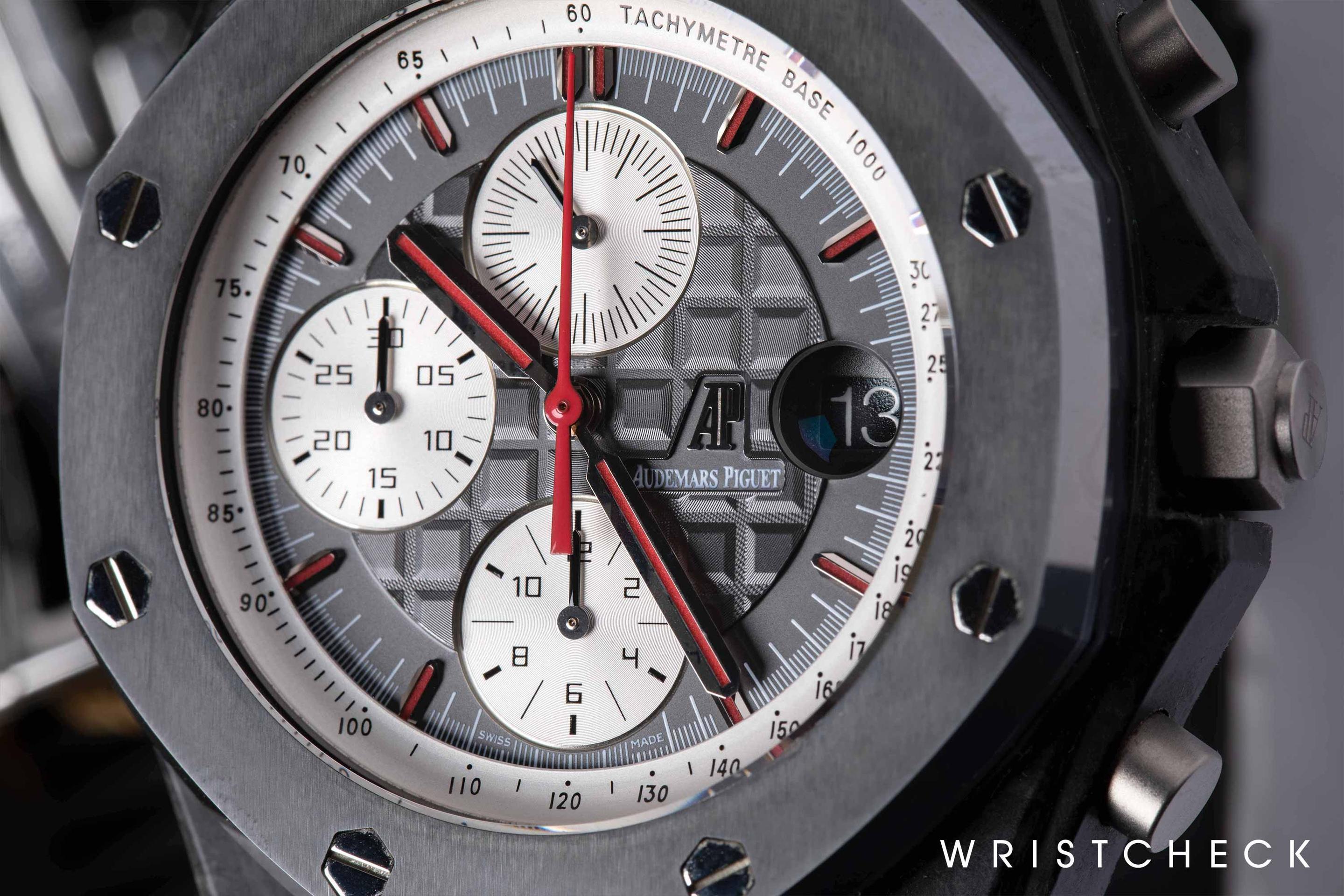 Forged carbon case, cermet bezel, sand-blasted titanium crown and pushpieces
